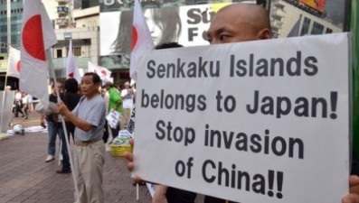 Japanese citizens protesting Chinese actions near the disputed Senkaku Islands.