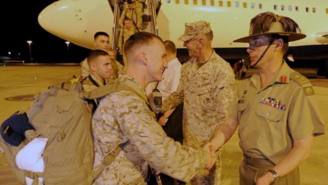 In 2010, the Obama Administration announced that the northern Australian military base in Darwin would see the permanent deployment of roughly 200 United States Marines as part of the Obama Administration's "Asia Pivot." This photo is of the first U.S. Marines arriving at Darwin, being greeted by their Australian counterparts.